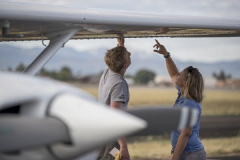 student pilot and flight instructor doing pre-flight